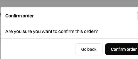 Confirm order dialog asking the seller to confirm, with Go back and Confirm order buttons